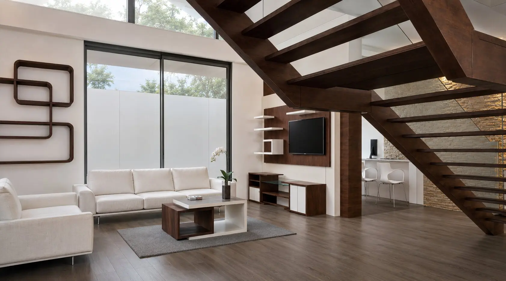 Salón y escalera escultórica — Casa Modelo Green Valley